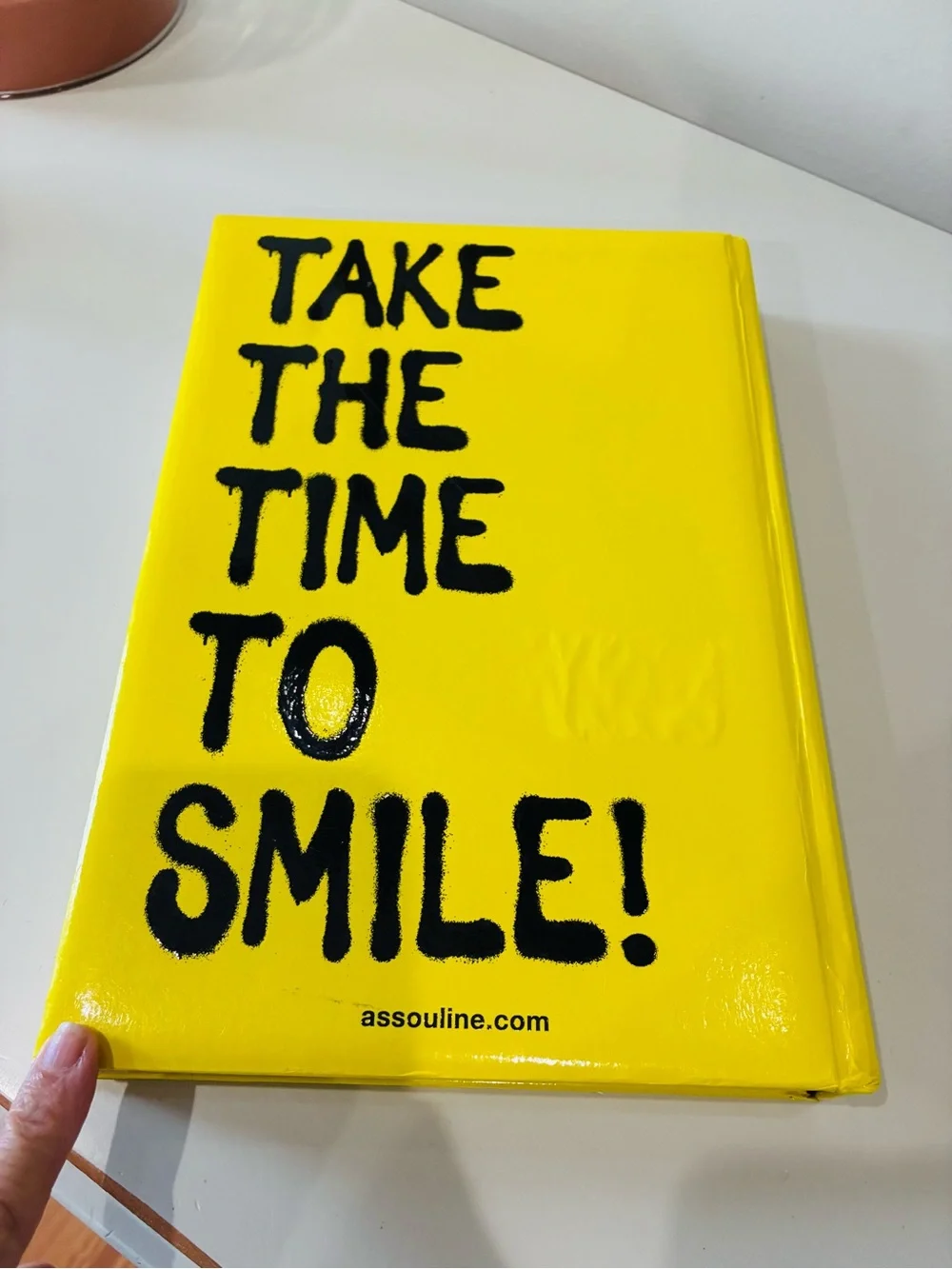 ✨ Brighten up your home with this stunning, vibrant yellow Assouline pop-culture